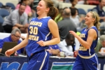 Action between Sarasota Christian (dark) and Academy at the Lakes in the girls basketball Class 2A State Semifinal on Tuesday at The Lakeland Center. STAFF PHOTO / DENNIS MAFFEZZOLI